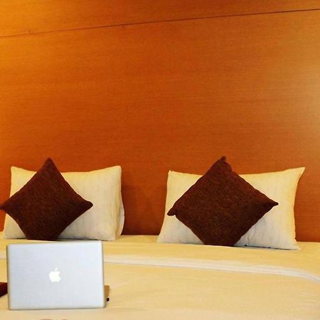 Grand Asia Hotel Macasar Habitación foto